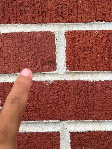 Siding Inspection (Brick & Mortar) Visible hail damage.