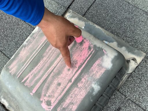 Hail damage that was inspected in person on a turtle box vent.